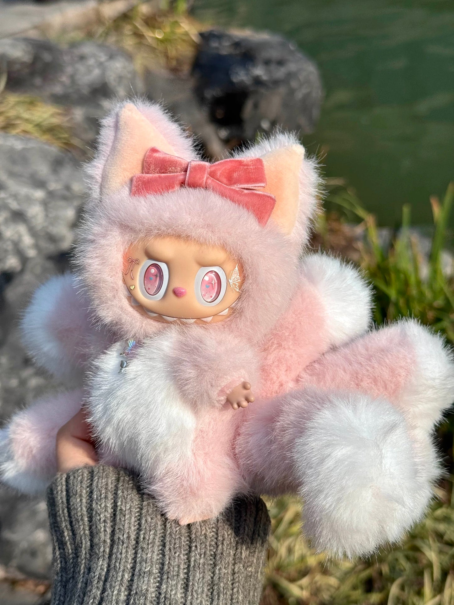 artist made labubu with pink floral tail design