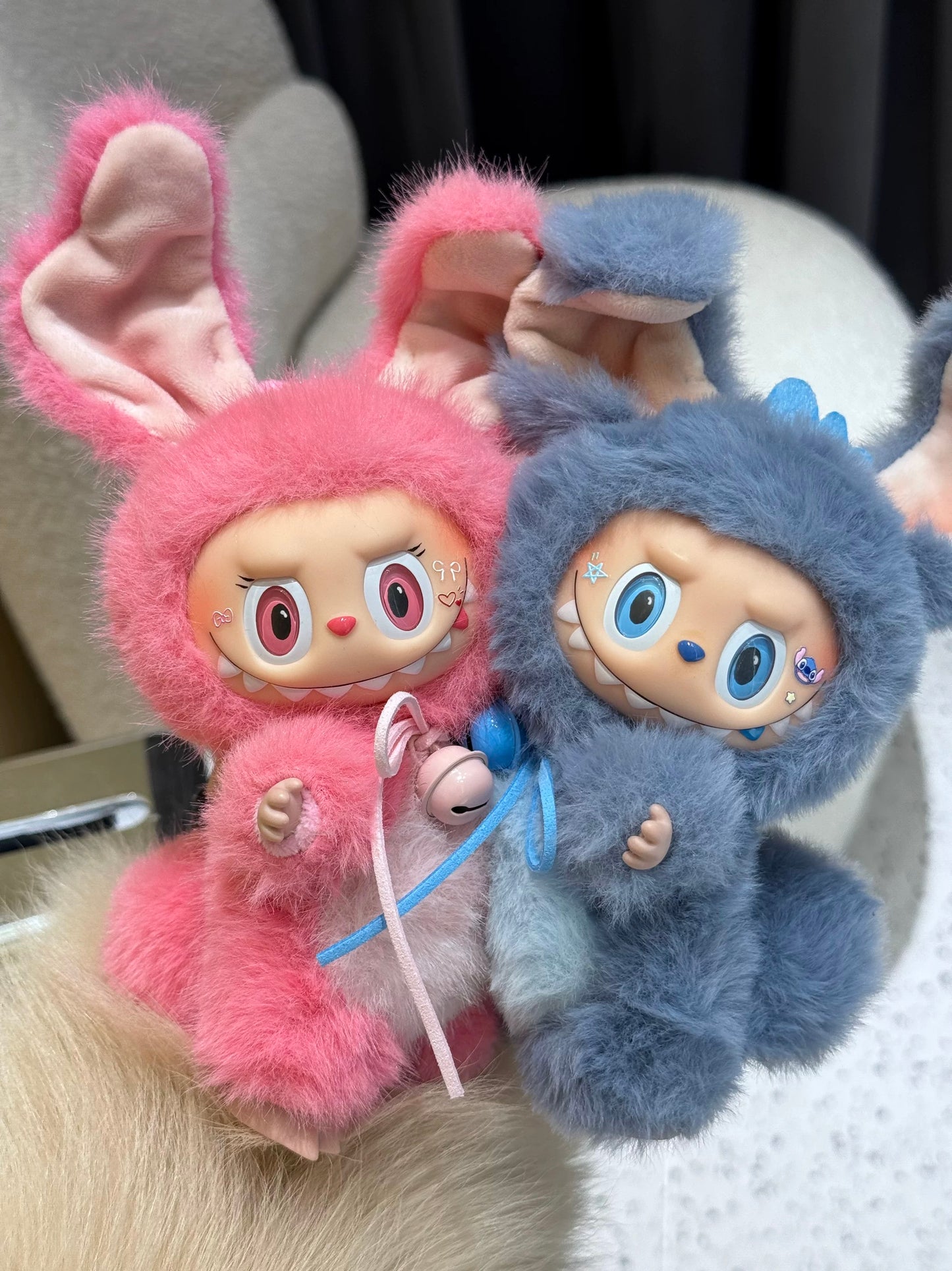 labubu designer plush with bell necklace detail