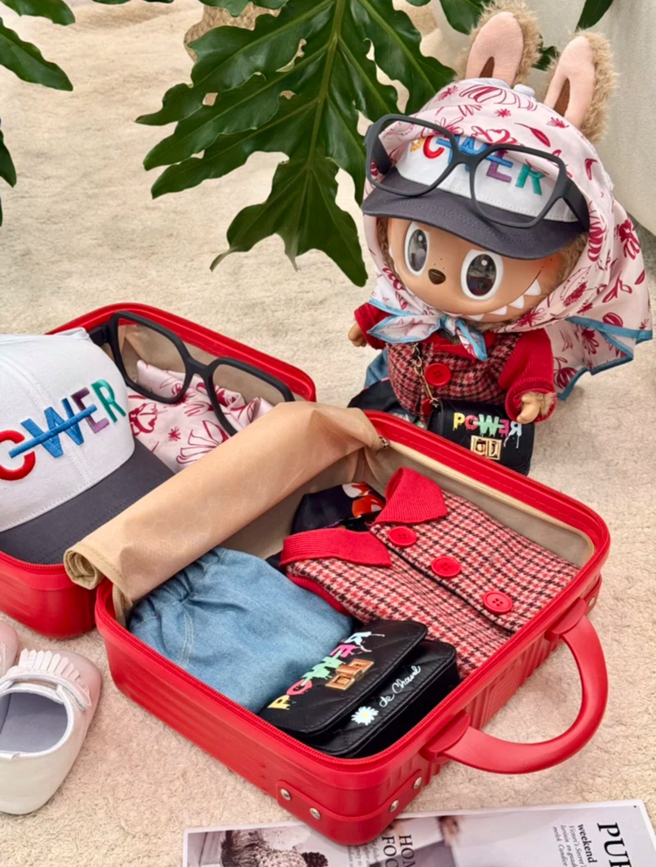 pop mart labubu in G-Dragon streetwear style accessories including scarf and mini bag