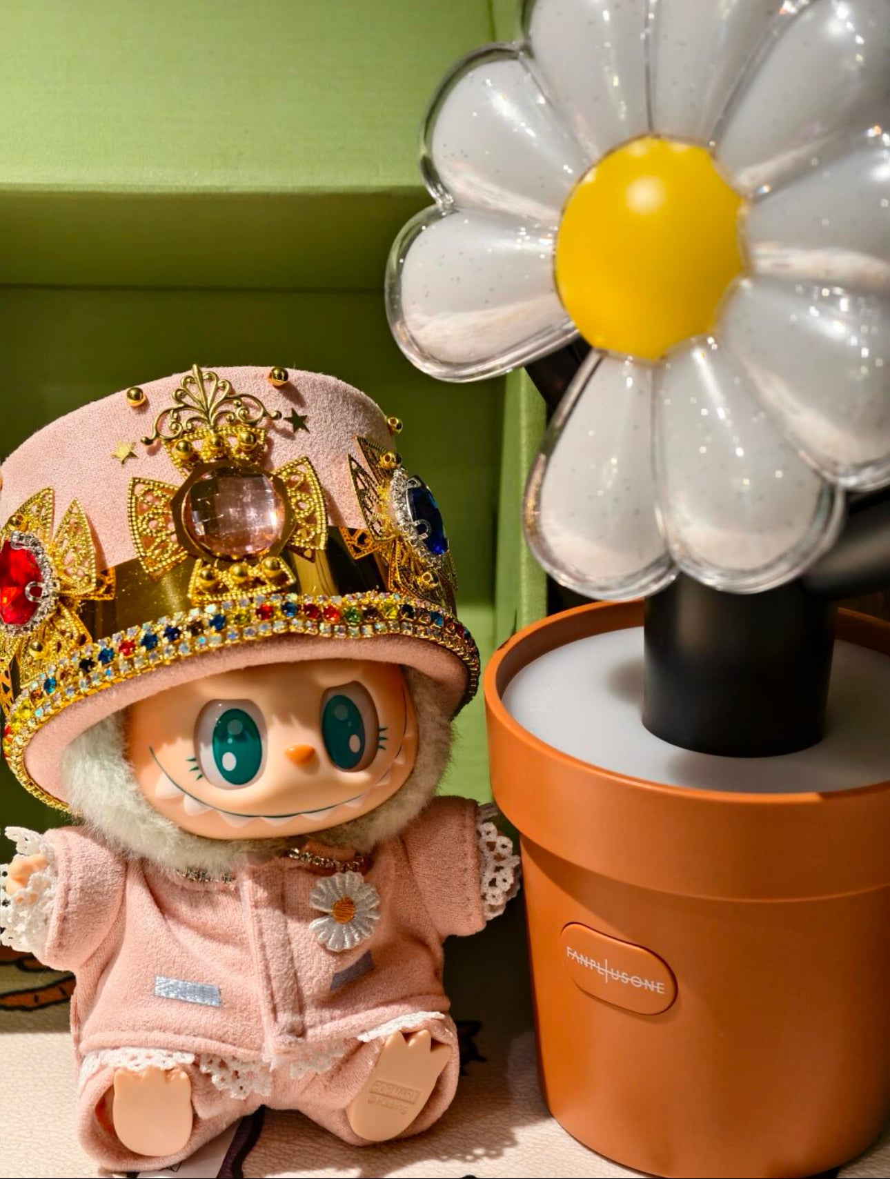 labubu wearing gdragon inspired pink crown outfit
