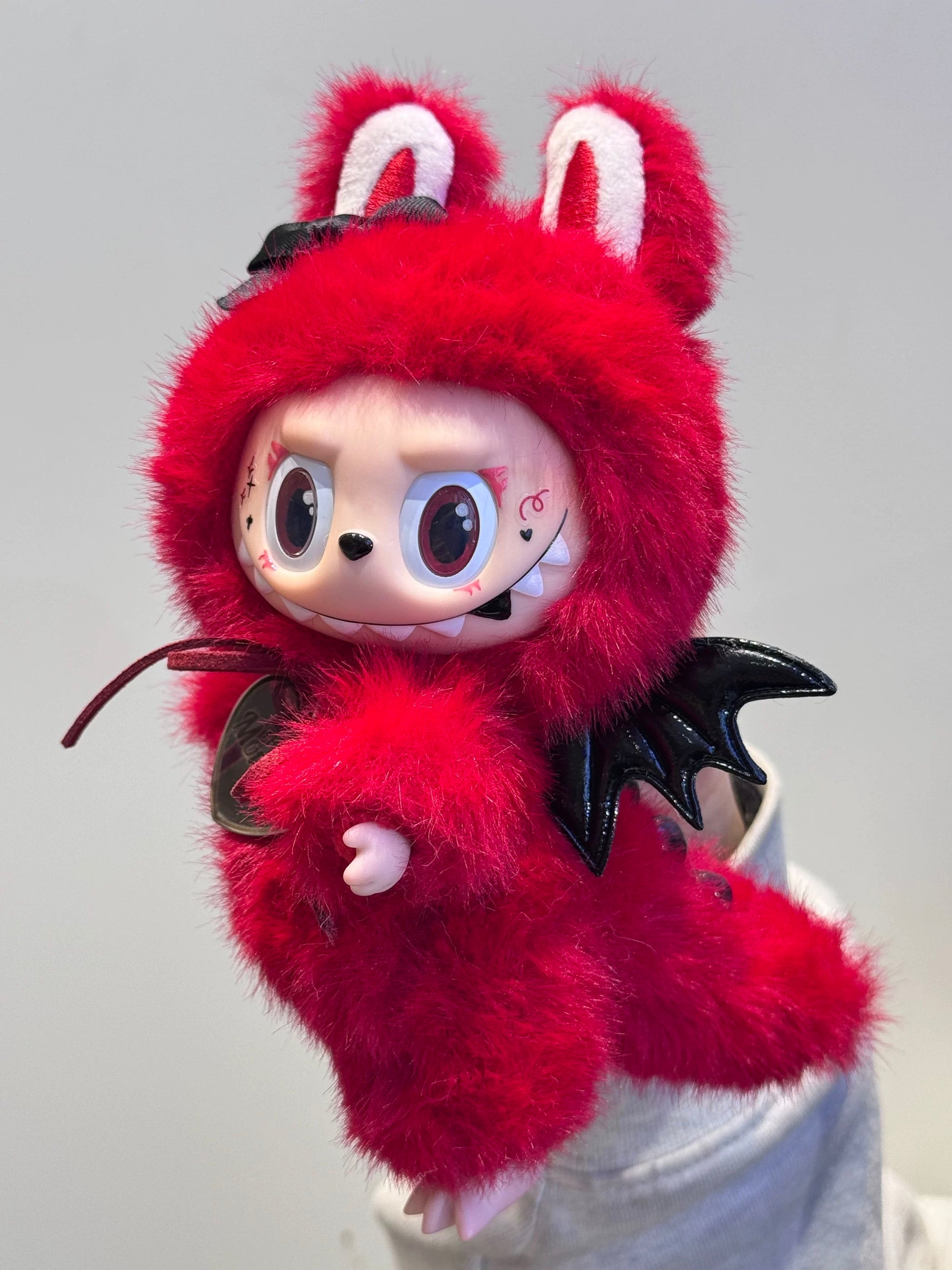 labubu designer custom plush toy with red rock flair