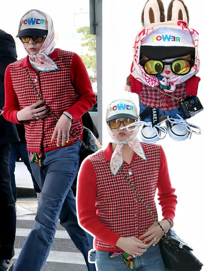labubu doll wearing g-dragon airport inspired outfit with hat glasses bag sweater pants shoes