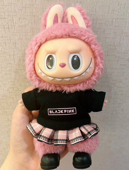 Plush toy Labubu with a pink outfit and black shirt featuring 'BLACKPINK' 